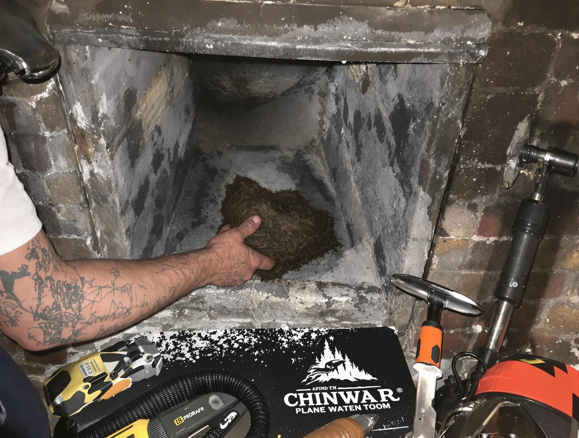 Pleasant View Chimney Sweep safely removing debris and screening chimney in Pleasant View, TN